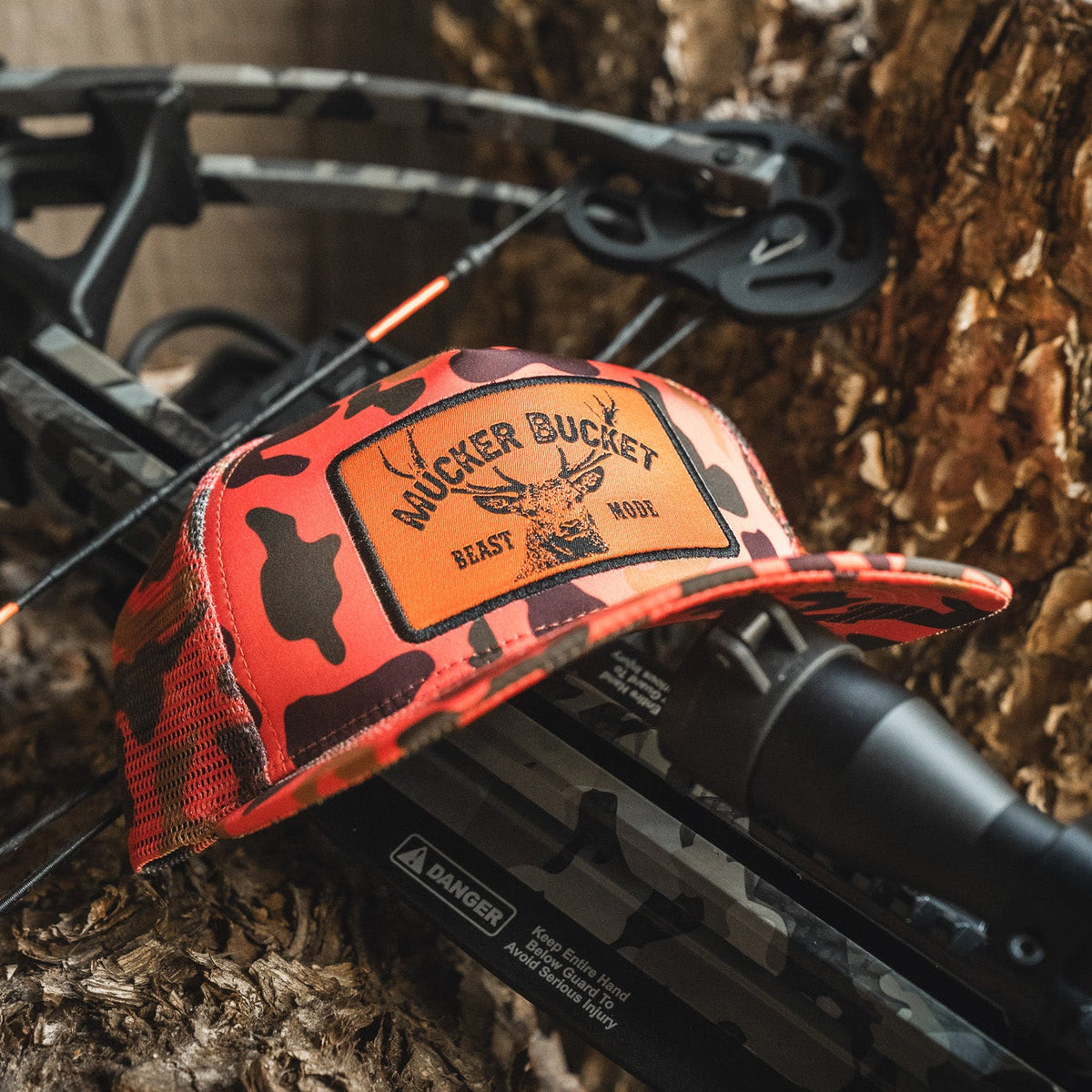 Mucker Bucket Beast Mode Orange Camo Trucker Bucket Hat