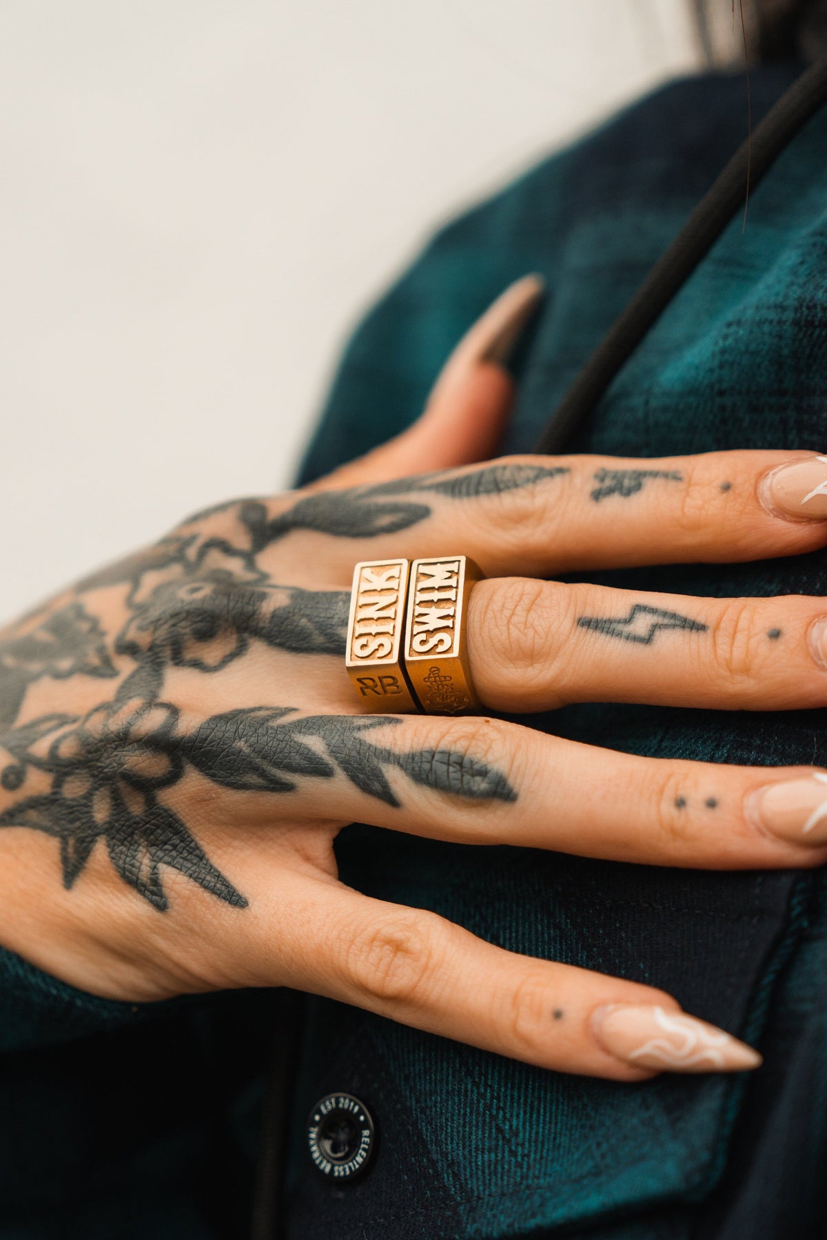 Relentless Betrayal Gold Sink or Swim Rings | Statement Ring