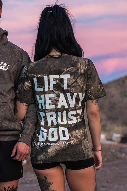 Lift Heavy. Trust God. - Realtree Premium Camo Tee